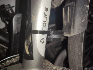 Bicycle mudguard mount extension