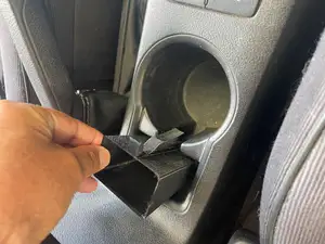 Coin holder for a Toyota Hilux