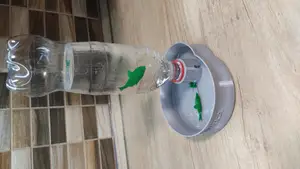 Cat drinker with fish toy