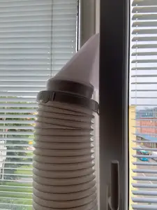 Air conditioner exhaust into the ventilation window