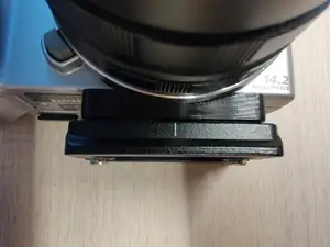 Sony NEX-5 tripod mount spacer