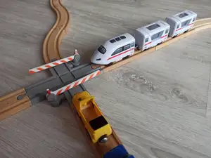 Wooden train track - Railway crossing with barrier