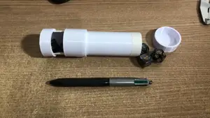 Compartmentalized Cylindrical Container for Dice, Bills and Coins