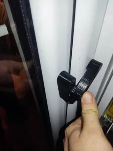 Balcony door holder
