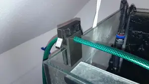 Garden hose holder clamp