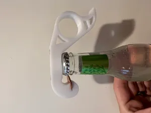 The Penny Popper: A one handed magnetic bottle opener for your fridge