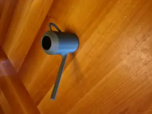 Small watering can with removable reduction.