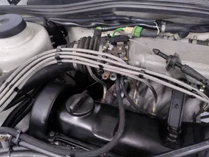 Golf 2 holder for ignition cables and injection lines