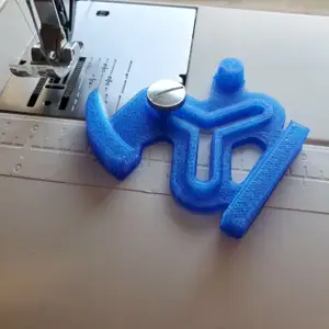 Sewing machine curve guide