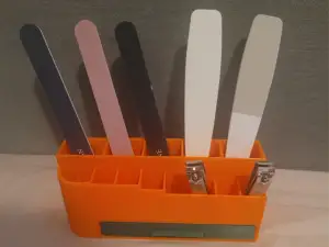 Nail file organizer with drawer