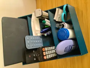 Compact organizer for TV remotes, tab computer, pens and bits and pieces. 20 x 16.3 cm. No supports! Should use a brim, though.