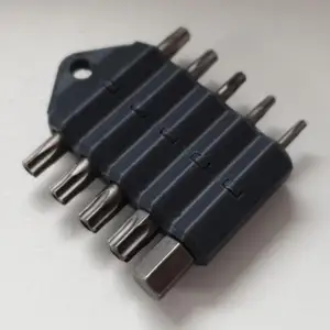 Bit holder for 10 6.5mm bits with space for magnets and hole for split ring