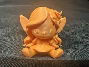 Blossom Sitting Chibi Fairy with Flowers in hair Figurine