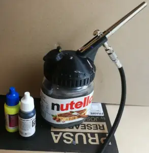 Airbrush cleaning pot from Nuttela jar