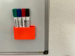 Magnetic pen holder for whiteboard