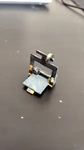 Miniature 3d printer, no supports needed