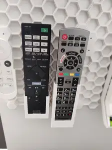 Honeycomb storage wallmount for RMT-AA320U remote - for sony str-dn1080