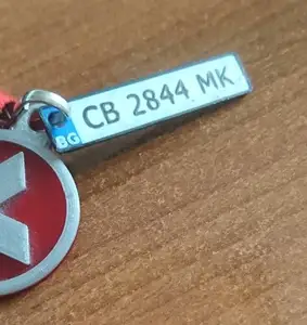 Keyholder (keychain) with a plate number