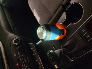 Cup holder extension for a 2017 Kia Sorento