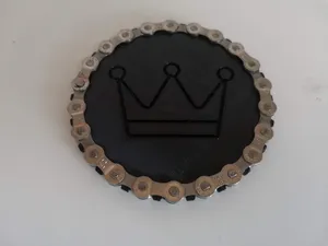 Chain coaster with a crown logo