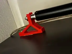 Storage hanger for flash light stand tripod