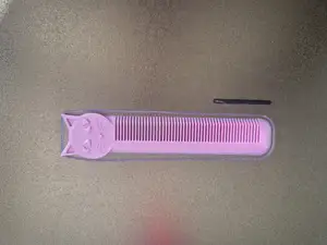 Cat head comb