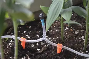 Plant watering hose holder stick