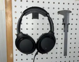 peg board mount collection for headphones and Mitutoyo calipers
