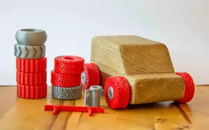 Basis 4 handmade Toy Cars with changable tires and bearings.