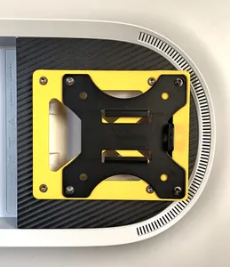 VESA 100x100 adapter to shift the monitor by 25mm.