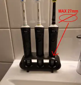 Toothbrush stand for 3 Oral B toothbrushes.