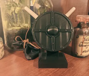 "A pen is mightier than a sword" pen holder