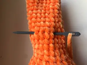 Big crochet needle. Great for plush yarns and alize puffy.