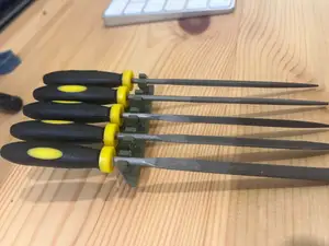 Honeycomb wall needle file holder