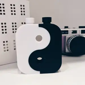 Yin Yang thin travel bottles with cap (shampoo/conditioner)