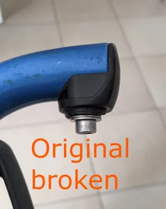 Plastic connector: wheelchair footrest and frame.