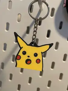 Surprised Pikachu keychain and magnet