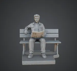 Man Sitting on Park Bench – Casual Newspaper Reader