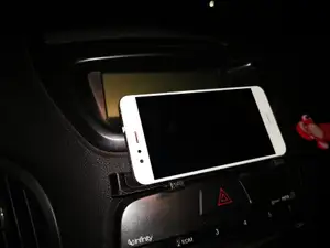 Ultra minimalist phone holder into the car