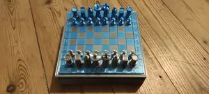 Portable chess / checker game magnetic