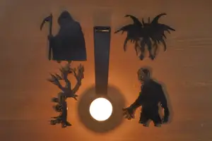 Halloween tea-light shadow projector