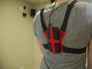 Chest tracker battery mount for wireless VR