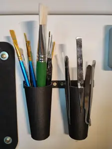 Wall holder for brushes
