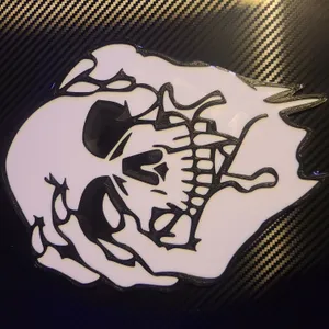 Zombified hand holding skull