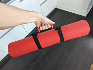A dignified yoga mat carrier