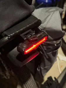 Bike rack tail light mount
