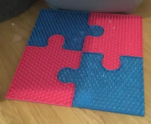 Puzzle-style cat rug