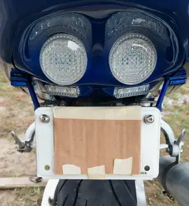 Motorcycle license plate mount/hanger.