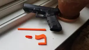 Pistol training tools and safety devices
