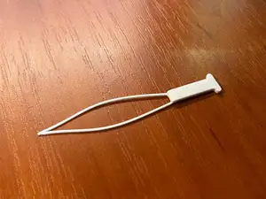 Tool to fix snag in a sweater or knitted fabric
